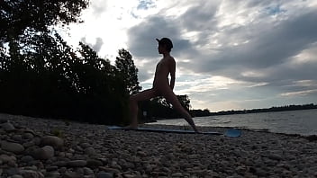 Preview 4 of Masagge Dh - Slender nudist boy does yoga nude on a naturist beach. Naked yoga video by Jon Arteen gay porn model
