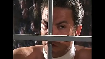 Preview 1 of Itchy And Hot - Fit hunk gets locked up in a cage where he fucks a sexy Asian brunette Asia Carrera