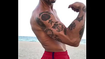 Preview 2 of Fhimel Fhimel - BICEP FLEXING  AT THE BEACH