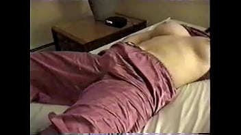 Preview 2 of Real Nymphomaniac - Brunette slut masturbates on the bed fingering herself and rubbing her clit