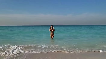 Preview 1 of Condom School Girl Rap - Naughty Monika Fox POV Blowjob With Cum On The Beach