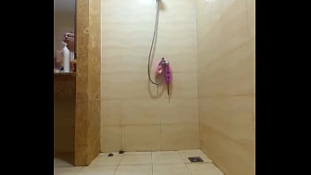Preview 1 of Arab Webcam Amateur - Shower. Voyeur camera. Nude Regina Noir in the shower washes and rubs with oil. Vert