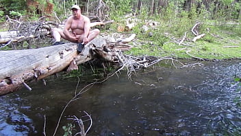 Preview 1 of Xxxey Good Video - Naked on a log and in the stream.