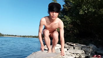 Preview 4 of Asian Chubby Webcam Tumblr - Gay twink does naked yoga outside on a rocky beach,  gay cruising men passing by might watch him