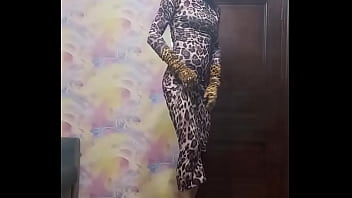 Preview 2 of Dise Pone - Crossdresser in leopard dress smokes and poses with vibrator plug