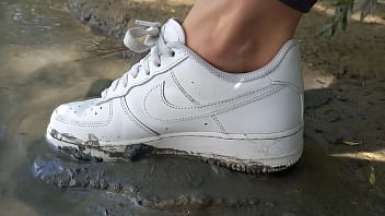 Preview 3 of Skinny Fans Com - Jon Arteen plays in the mud with his new sneakers Nike Air Force One AF1 sockless. Boy foot fetish gay porn video