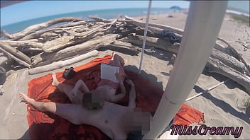 Preview 1 of English Xvdeo Movi - Exhibitionist Teacher Outdoor Amateur Milf Handjob Big Cock on Nudity Beach public in front of voyeur with cum P1 - MissCreamy