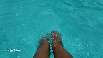 Preview 1 of Tubxporn Vargin Com - Feet in the pool with a lot of water