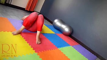 Preview 2 of Www Xxxvieo - Regina Noir. A woman in yoga leotards practices yoga in the gym. Transparent red leotard yoga. FULL VIDEO