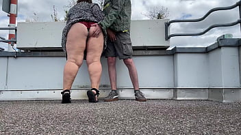 Preview 1 of Chaude Coquine Au Lit - Spanking a sexy MILF&#039_s gorgeous fat ass while she jerks off my cock on the top of the parking lot