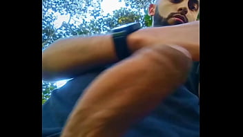Preview 2 of Gays Solo Gay - Big uncut cock latino jerking outdoors in the woods and eating his tasty cum careful not to get caught. What do you do if you find me like this?
