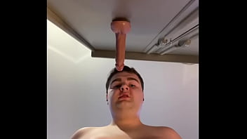 Preview 2 of Celebrity Sex Clipd - Gay 22 year old smooth chubby cub boy sucks and deepthroats his dildo sloppily,  covering his face and chin in spit