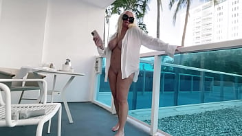 Preview 2 of Sister C - Blonde Big Tit Babe Plays with Her Pussy on a Public Hotel Balcony