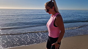 Preview 1 of Short Lesbian Horney Videos - Milf is having a morning walk at the beach and she needs to take her bra off