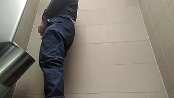 Preview 2 of Black Lebo Mom - Young guy peeing with his uncut cock in a highway toilet
