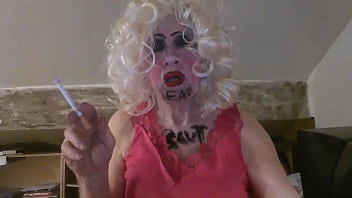 Preview 1 of Kiss Beautiful - CD Sissy Sarah Millward knows her ID,  as indicated by what&#039_s written on her face and chest - &#039_fag slut&#039_ -   as she smokes,  wanks her clit,  and stuffs a dildo up her nasty lady hole