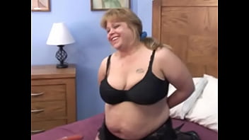 Preview 1 of Please Dont Gum Inside Me Son - Fat blonde in stockings fingers her wet old cunt on a couch